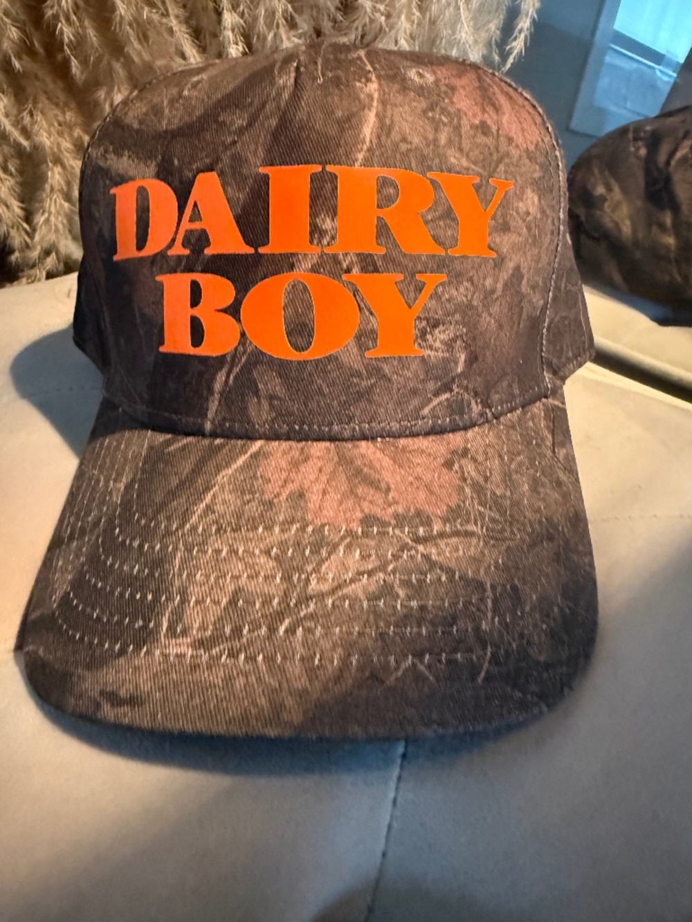 Dairy Boy Trucker  hat camo orange NWOT
